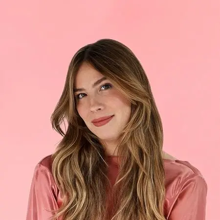 7 author Shoutouts Emily Henry with long, wavy hair.