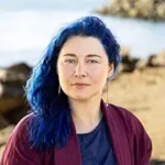 Homebound Homebound author Portia Elan with blue hair by water