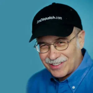 Author Shoutout author shoutouts Tom Engelhardt smiling with glasses and hat