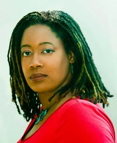 Author Shoutout Author Shoutout N. K. Jemisin with dreadlocks in red shirt