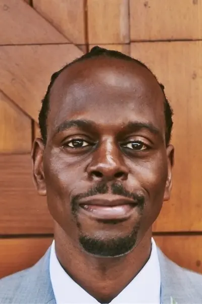 Author Shoutout Author Shoutout P. Djèlí Clark in suit with neutral expression.