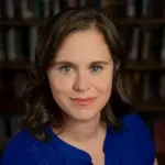 The Gates of Midnight The Gates of Midnight author Helene Wecker with brown hair and blue shirt