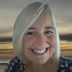 Daughters of Green Mountain Gap Daughters of Green Mountain Gap author Teri M. Brown smiling with light hair